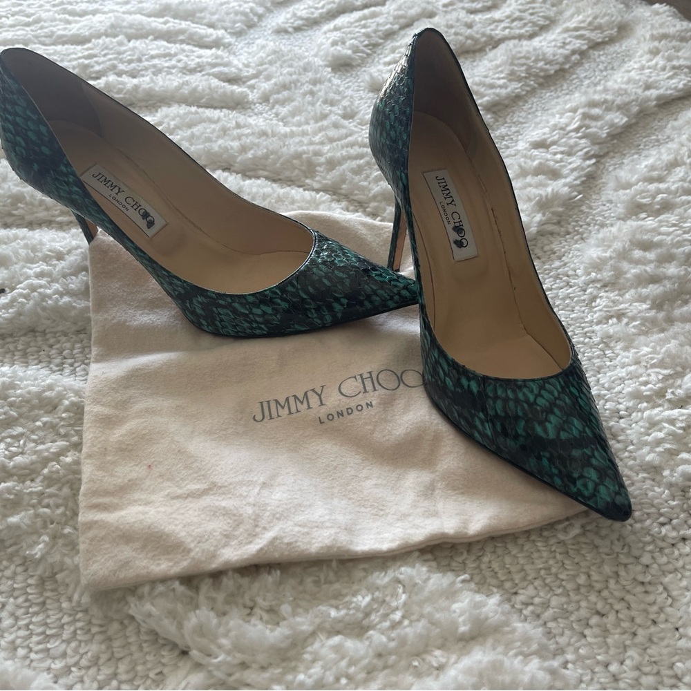 Jimmy Choos in teal and black snakeskin pattern. Worn only a few times. 85cm.